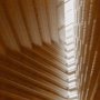 sepia photograph of narrow slot atrium